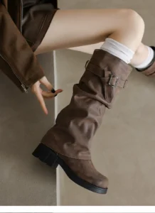 Distressed brown slouch tall women boots, adjustable buckle strap and sturdy block heel